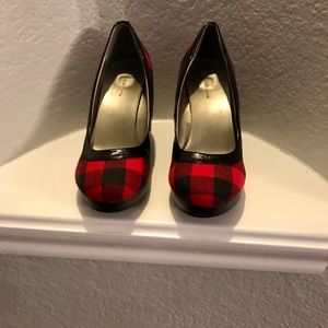Red and black checkered wedge shoes